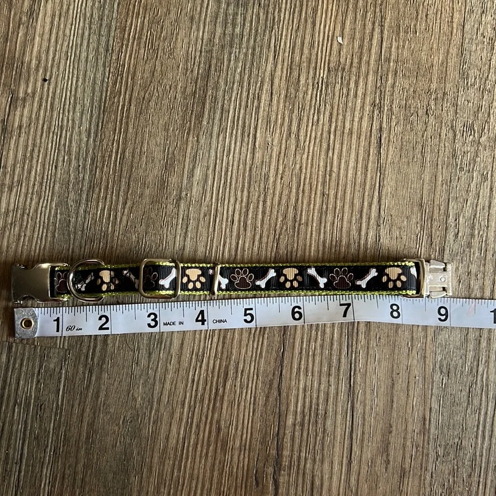 Small dog collar paws and bones black brown and green